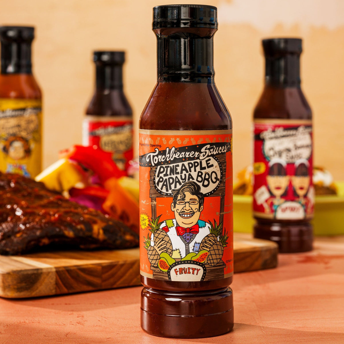 Pineapple Papaya BBQ sauce with other TorchBearer Sauces in the background