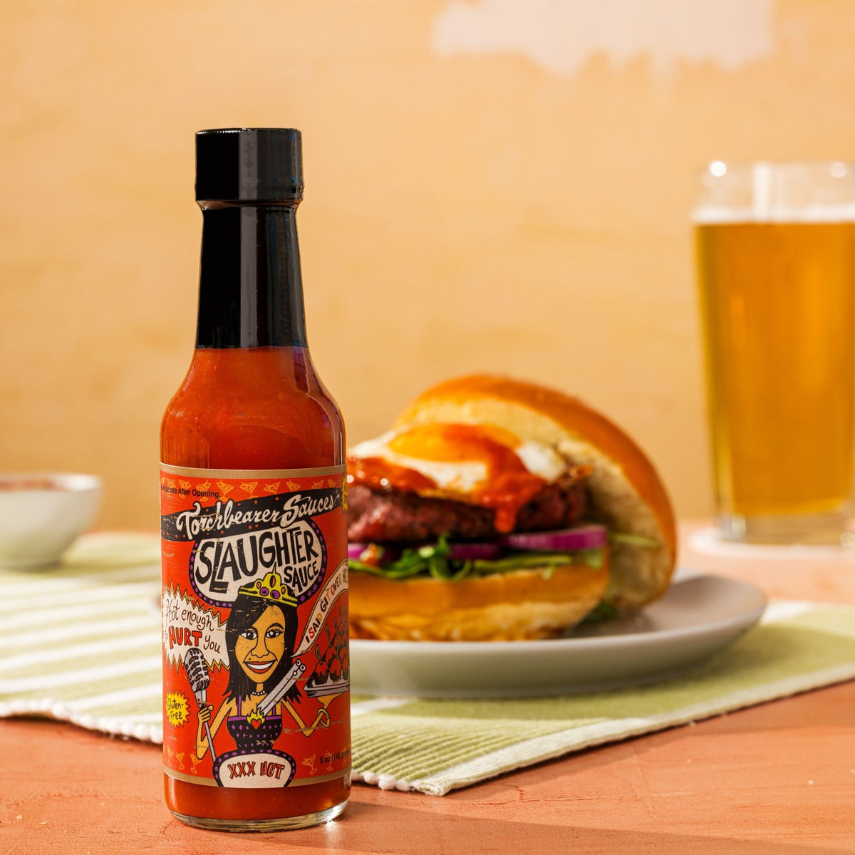 TorchBearer Habanero Slaughter Sauce™ with burger