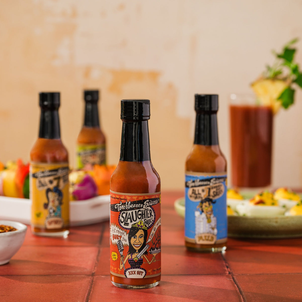 TorchBearer Habanero Slaughter Sauce™ with other hot sauces