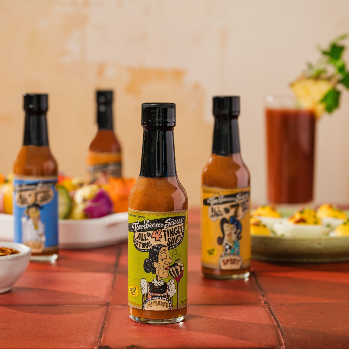TorchBearer Tingly Sauce™ with other hot sauces